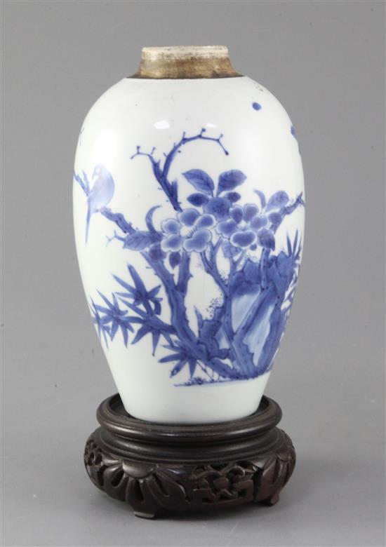 A Chinese blue and white ovoid jar, Transitional period c.1640, 18cm, wood stand